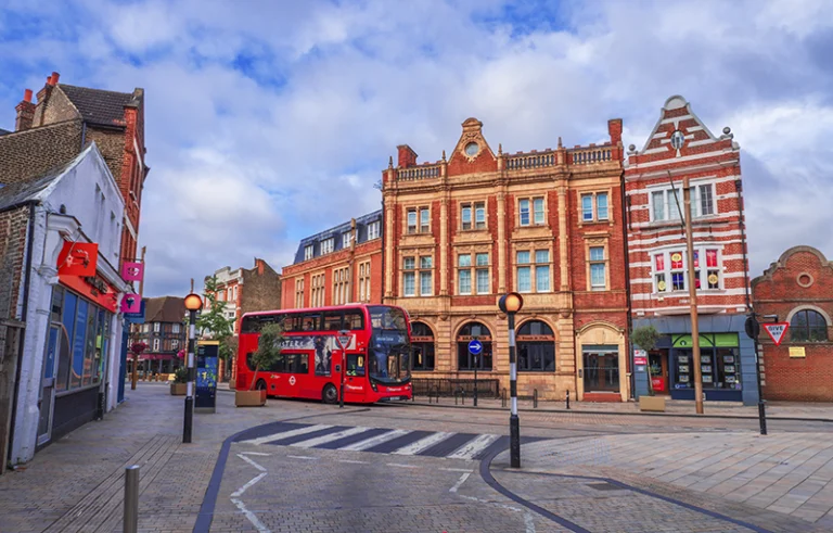 Image of Bromley High Street with a bus going past towards the train station